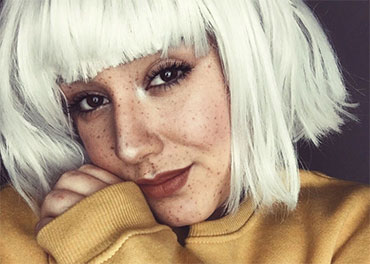 Big fringed, blunt bob white hair